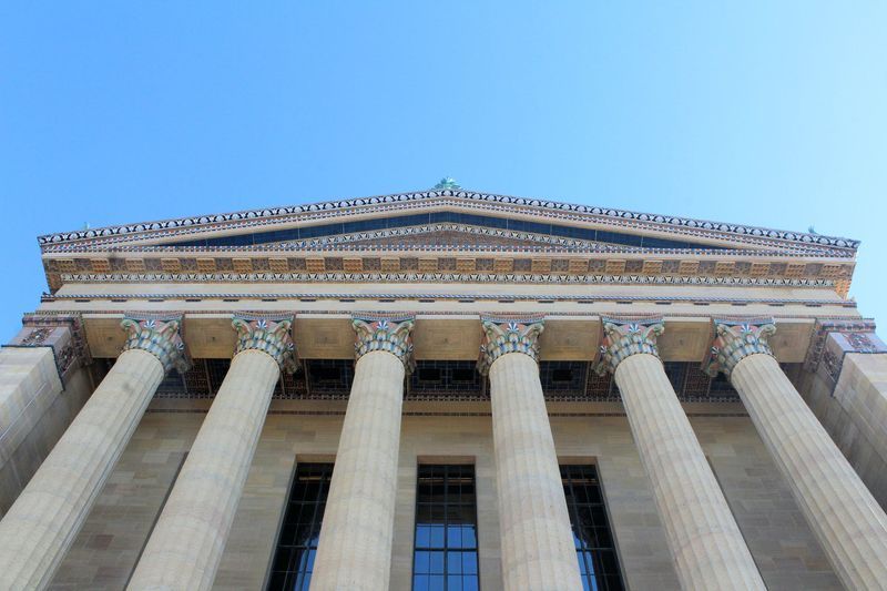 Exterior facade of a government building with large columns